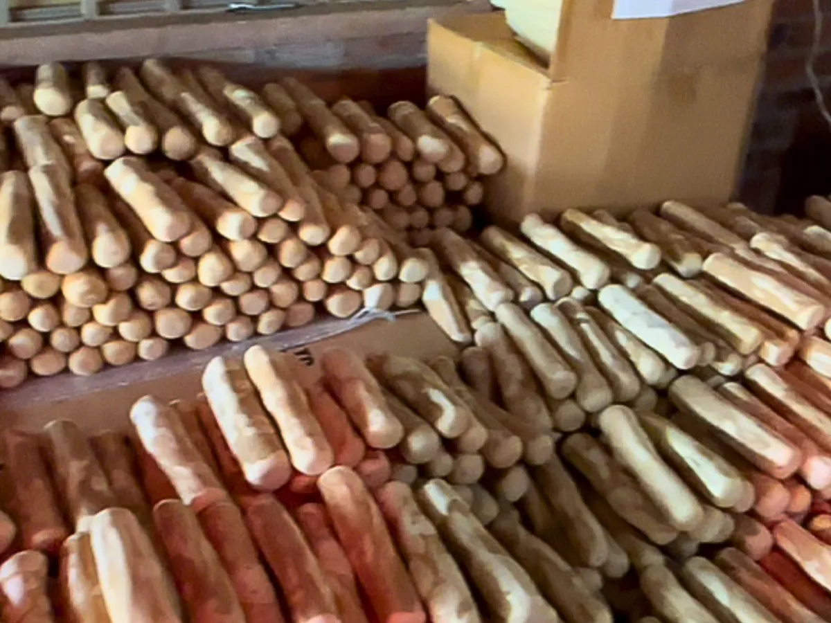 Coffee wood sticks stacked on racks