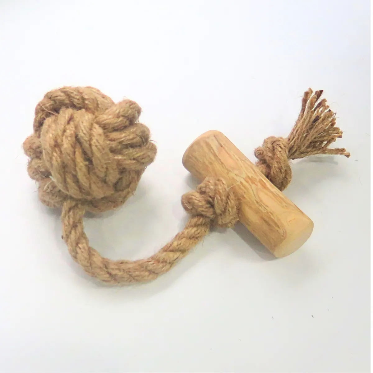 A coffee wood stick on a cord with a knotted hemp rope ball