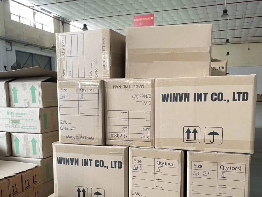 Cartons printed with company name, size, quantity and net weight fields